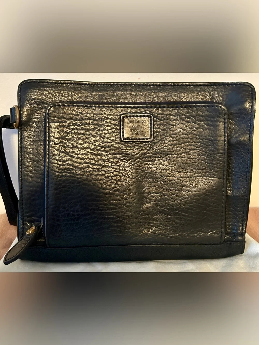 Burberrys pebbled leather crossbody / clutch bag from the pre-1999 era
